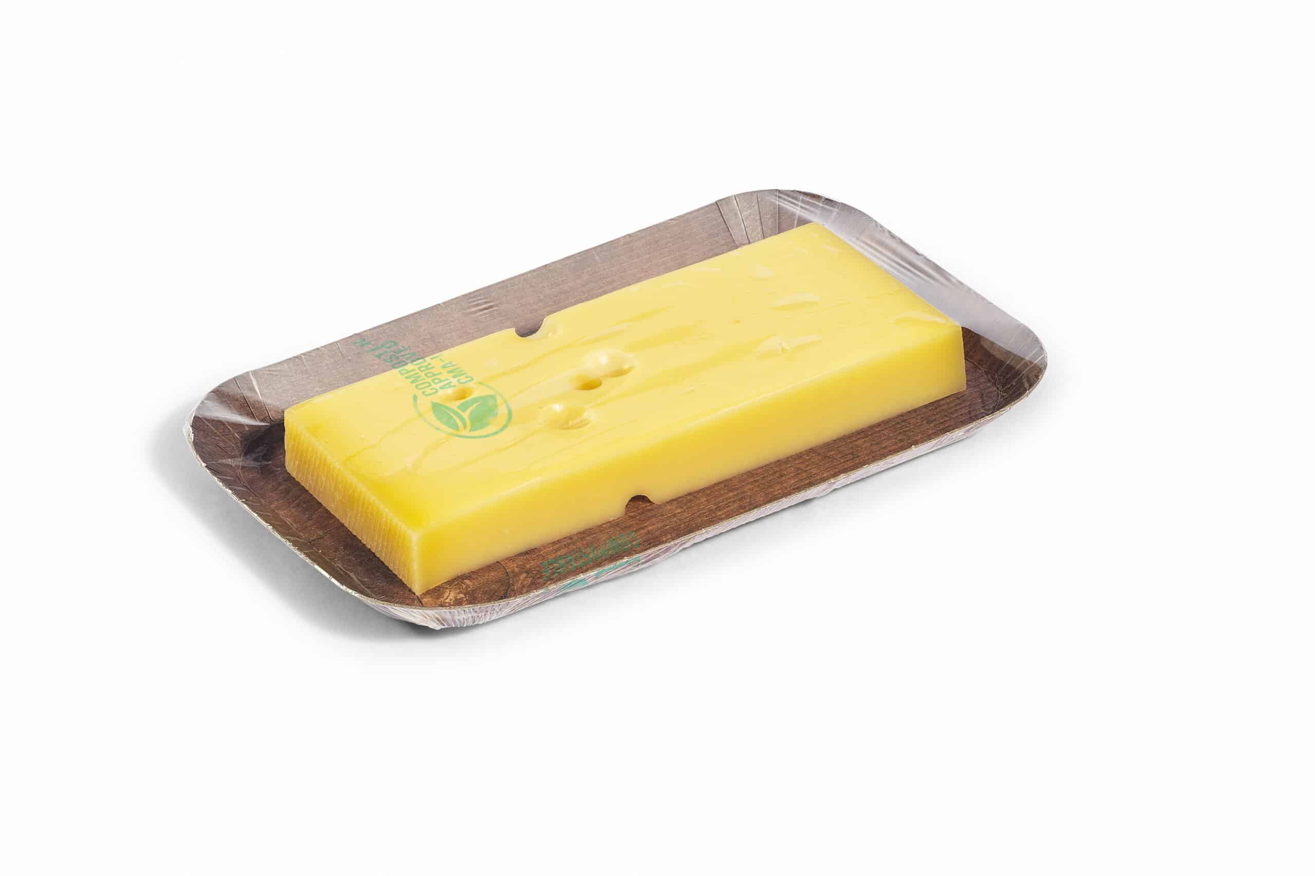 Compostable cling wrap covering cheese